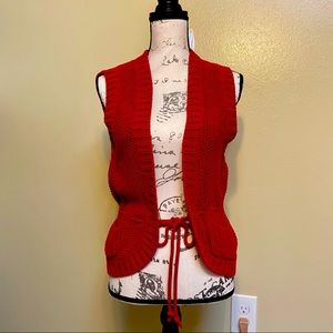 Red sweater vest